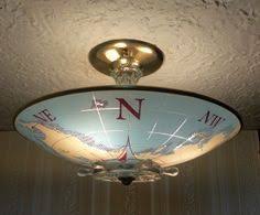 Led flush mount ceiling light fixtures come in many different styles from frosted, glass fixtures to crystal flush mount lights that seamlessly blend with the decor to refined, metal lights that. Nautical Ceiling Light And Captain S Lights Ceilings With Fixtures Flush Mount 236x195px