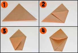 Fold the top and bottom edges of the wrapping paper, pushing the bottom edge inward to form a triangle shape; Kraft Paper Popcorn Bags Typically Simple