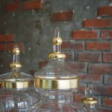 Add style to your home, with pieces that add to your decor while providing hidden storage. Set Of 3 11 16 18 Tall Glass Apothecary Jars Containers Gold Trim Leilaniwholesale