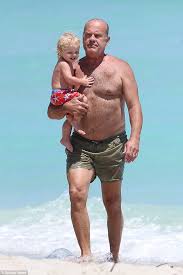 Wife kayte grammer gave birth to a son, kelsey gabriel elias grammer, on july 22, 2014 at 8:28 a.m. Shirtless Kelsey Grammer Holds His Son Gabriel Close During Beach Day In Miami Daily Mail Online