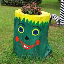 Bob vila says if you're handy with paints or carving tools, an ugly tree stump can become a work of art. Creative Garden Ideas For Tree Stumps Lovetoknow