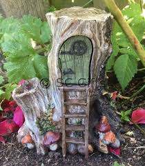 This Fabulous Tree Stump Fairy Home Is Just The Thing To Add That Extra Magic To Your Fairy Garden Cleverly Crafted From Front Garden Fairy House House Front