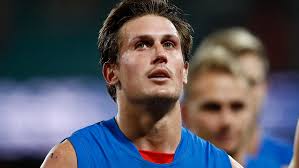 AFL captain David Swallow wades into rugby league's 'no jab, no play'  debate