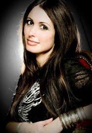 SIMONE CHRISTINAT yes another simone who's beautiful and has an amazing voice from a really good band.LEGEND AUREA