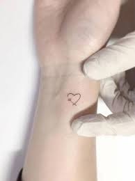 173 Cute And Inspirational Small Tattoos With Meanings 5 Thereds Me Tiny Tattoos Hand Tattoos Tattoos For Daughters