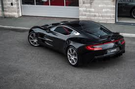 Image result for Jet Black 2011 Aston Martin