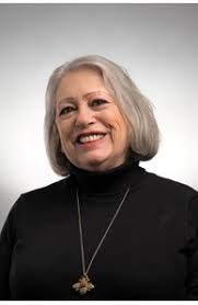 Joan "Joni" Vicente, Real Estate Agent