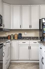 This Kitchen Was Refaced With White Laminate In A Classic Design A Glaze On The Doors Highlights The Details Of The De Kitchen Refacing Kitchen Design Kitchen