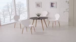 Dinanna dining table an elegant stylish dining table of wood finished with veneers in brown shades. Round Wooden Black Dining Table And 4 White Chairs Homegenies