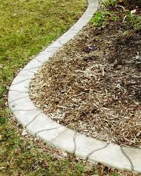 Curved garden edging may fit better with a natural theme, and a narrow bed is easily overwhelmed by a wide border, just as short plants would be by a tall similar to edging stones, pavers are made with concrete and come in a variety of shapes and colors. Concrete Landscape Edging Looks Like Flagstone Home Garden Qctimes Com