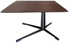 The collection of tables features the same single leg that splits into three feet at the base. Fly Square Side Table Flexform Milia Shop