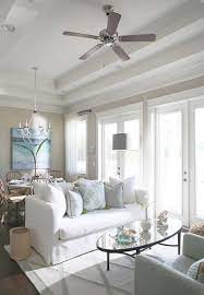This place really shows that you can make any small space appear bigger than it is with you choose the right paint color, furniture and. Beach Cottage With Small Neutral Coastal Interiors Home Bunch Interior Design Ideas