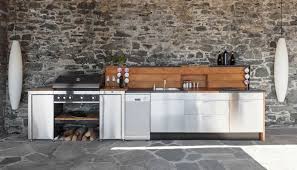 The exquisite natural stone patio brings it all together. Covered Outdoor Kitchen Pergola Louvered Roof Azenco