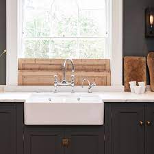 (farmhouse sinks typically don't have cutouts for faucets, so faucets are drilled through the alternatively, you can buy specialty apron front farmhouse cabinet sink bases. Farmhouse Or Apron Sinks Everything You Need To Know Apartment Therapy