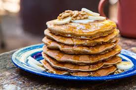 Top these banana bread pancakes with extra banana slices and a big drizzle of honey! Banana Bread Pancakes Fresh Off The Grid