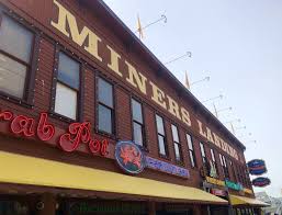 Seattle skyline, waterfront and great wheel across bell harbor marina. How To Enjoy Seattle S Waterfront Activities Without The Tourists