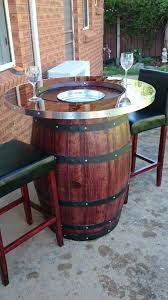 Wine Barrel Table Bar With Concealed Ice Bucket Under The Lid To Keep Drinks Cool Wine Barrel Bar Table Wine Barrel Table Barrel Table