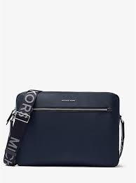 Messenger bags have been used for a lot of different things over the years. Hudson Large Gabardine Messenger Bag Michael Kors