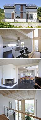 Einfamilienhaus Modern Mit Satteldach Architektur Innen Grundriss Offen Mit Galerie Kamin Und Verglastem Erker Design Fur Zuhause Modernes Holzhaus Holzhaus