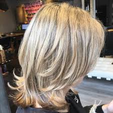 Then, bend over and comb all your hair into a ponytail at the top of your head. 70 Brightest Medium Length Layered Haircuts And Hairstyles