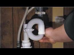 With large pliers, loosen the slip nut, which is a ring that keeps the tailpiece tightened to the drain, located on the underside of the sink drain. Kitchen Bathroom Repairs How To Install A Bathroom Sink Drain Trap Youtube