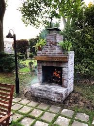 Outdoor Brick Fireplace With Wood Mantle Outdoor Fireplace Brick Diy Outdoor Fireplace Exterior Fireplace