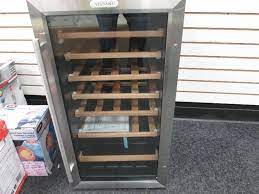 Homeowners are often curious of the age of their home appliances. Vissani 28 Bottle Wine Cooler With Home Store New And Return Household Shelving Yard More K Bid