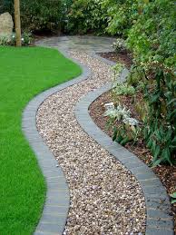 Pea gravel patios are a snap to keep clean! 25 Gravel Garden Paths With Pros And Cons Shelterness