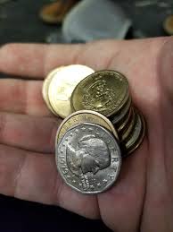 I recieved 15 dollars in dollar coins as change when i bought my subway  ticket (the silver ones are dollar coins too) : rmildlyinteresting