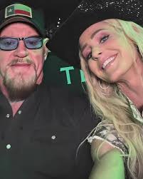 Gunther with The Undertaker and Michelle McCool