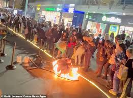 Drunk Man Stumbles Into A Ring Of Fire At Street Performance Video Hca Barbieri News