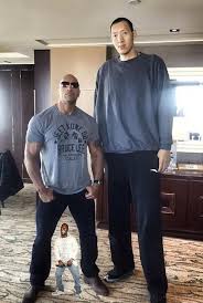 Kevin hart gives the rock a major mooseknuckle in the spine on the jumanji set. Kevin Hart Dwayne The Rock Johnson Standing Next To Sun Ming Ming Know Your Meme