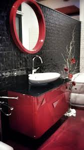 This Modern Bathroom Has A Vanity That Features A Built In Sink And A White Freestanding Bathtub That S P Bathroom Red Modern Bathroom Modern Bathroom Design