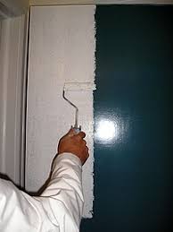 Use the rollers for both primer and paint. Painting Doors The Practical House Painting Guide