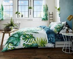21 Items That Ll Make Your Bedroom A Tropical Paradise Mostly Julia Duvet Cover Sets Tropical Bedrooms Duvet Sets