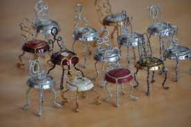 bistro chair collection that i fashioned from champagne cork cages after enjoying the bubbly champagne corks champagne chairs cork crafts diy