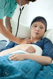 Brush up on your dance moves: Young Cancer Woman In Bed And Her Check Up By Young Doctor Stock Photo Picture And Royalty Free Image Image 33333506