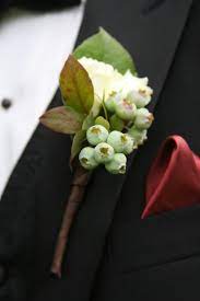 Kenny S Favorite White Garden Rose With Unripe Blueberries Lamb S Ear Instead Of These Leaves Pea Blueberry Wedding White Spray Roses Boutonniere Wedding