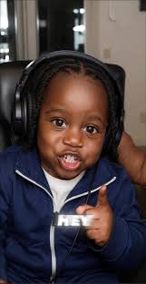 Duke Dennis Reading to Kids