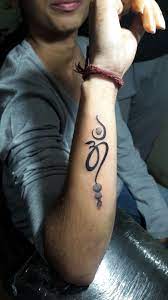 Here S A Beautiful Om An Rudraksh Tattoo Done My Dear Artist Badal Hope Guys You Like An Appreci Tattoos Rudraksh Tattoo Got Tattoo
