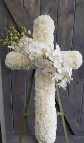 White is seen as a classic color that will not offend people with different cultures or religious background, it tends to be the most harmless option, all things that are appropriate when sending sympathy flowers All White Deluxe Cross In Rolling Hills Estates Ca Palos Verdes Florist