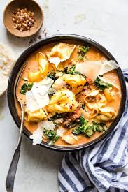 Tortellini Soup With Italian Sausage And Kale The Modern Proper Recipe Italian Sausage Soup Tomato Tortellini Soup Tortellini