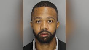 Cobb County man in custody after video shows dog thrown into wall