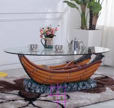 Uttermost 24338 vitya glass top metal leg coffee table antique forged gold. Ship Style Antique Glass Coffee Table My Aashis