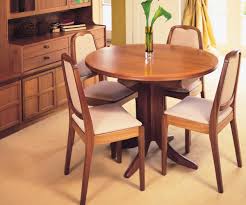 Set includes 1 table and 4 side chairs. Nathan Classic Teak 2164 Circular Pedestal Table Sunburst Top Dining Tables Rg Cole Furniture Limited