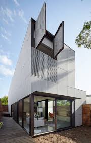 Perforated Shutters Animate Facade Of Melbourne House By Jackson Clements Burrows Architecture House Architecture Facade Design