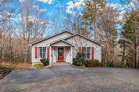 Open plan living with space for two appliances in the kitchen, granite tops and gas hobs. With Basement Homes For Sale In Taylors Sc Realtor Com