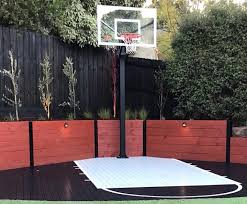 This photo is one example of how the homeowner creates a basketball court and golf area. Swish Court Design Your Own Court