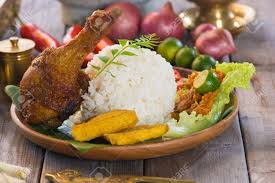 They used to be good, but lately their meal tastes awful, & it even worse as i had my lunch there today, i ordered 2 lele sets & the meals come to our table with overcooked to almost burnt fish. Nasi Ayam Penyet Indonesian Fried Chicken Rice Stock Photo Picture And Royalty Free Image Image 27749821