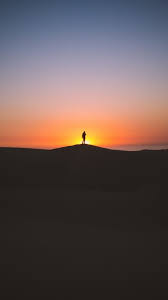 Man Silhouette Horizon Sky Sunset Wallpaper 1080x1920 Trail runner nature landscape man silhouette on mountains background in cold weather with clouds silhouette of man with open arms or hands standing on sea beach at sunset rays. man silhouette horizon sky sunset